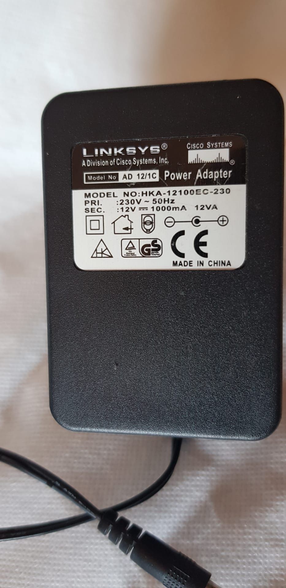 Transformador Linksys 12v 1A.   HKA-12100EC-230