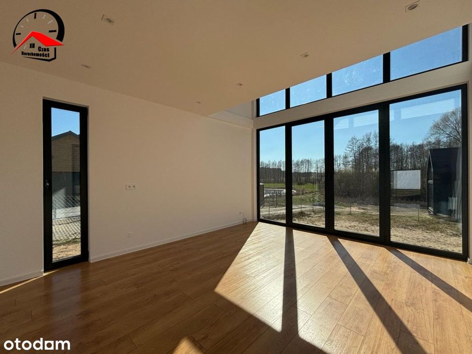 Nowoczesne domy typu stodoła otoczone jeziorami