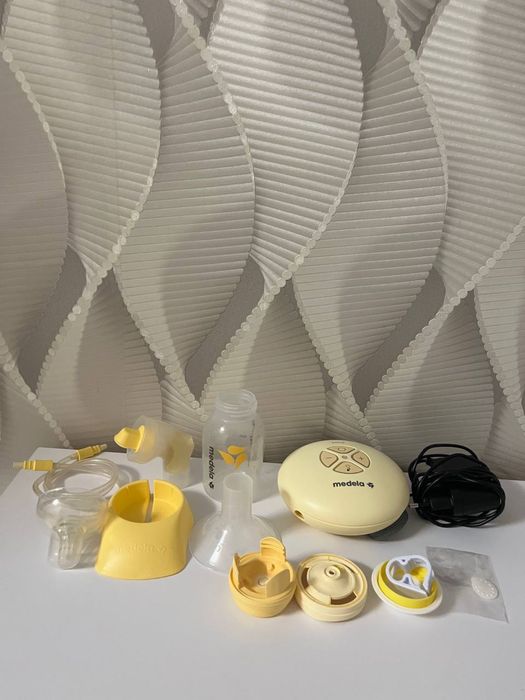 Молокоотсос Medela Sving