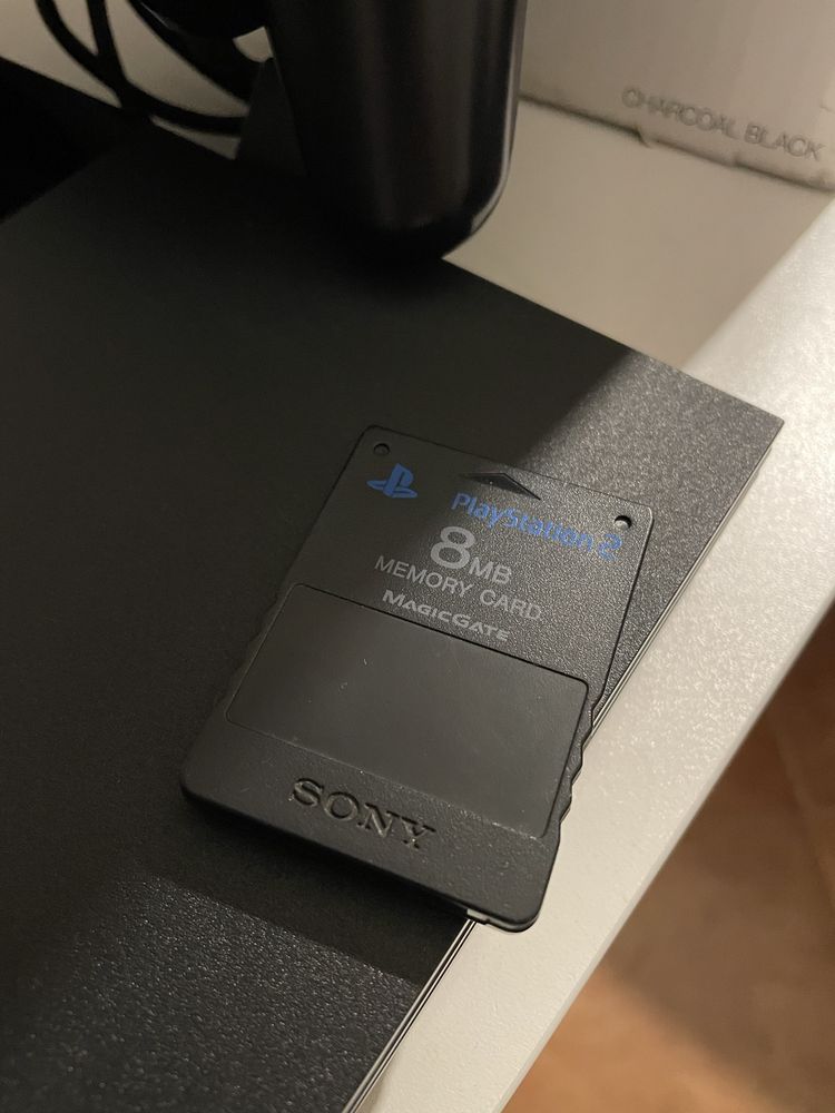 Playstation 2 c/comando e jogos