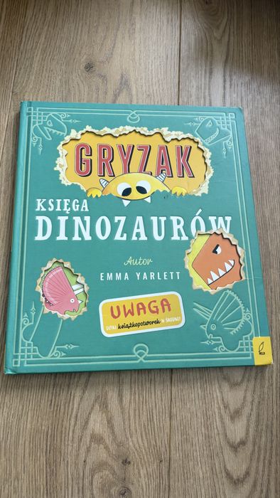 Gryzak księga dinozaurów