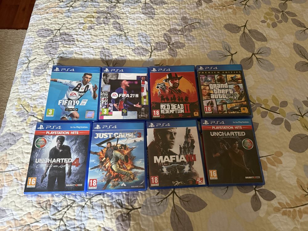 Ps4 slim 1TB comandos, cabo + jogos