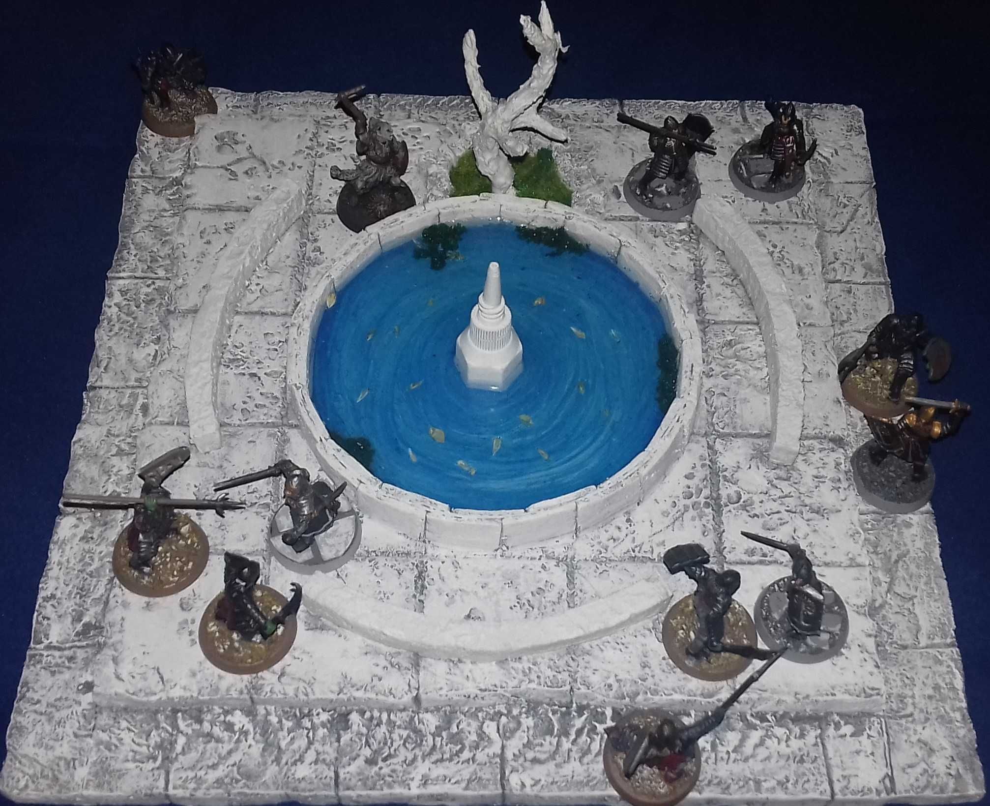 Miniaturas da Games Workshop e cenografia manufaturada