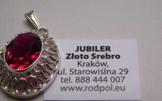 Przedwojenna srebrna zawieszka purpurowy kamień ażurowa oprawa.