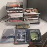 Odtwarzacz DVD z pilotem + 25 filmów DvD