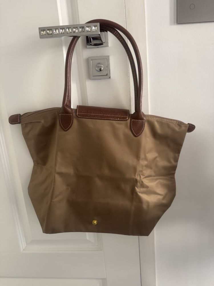 Longchamp terebka beżowa