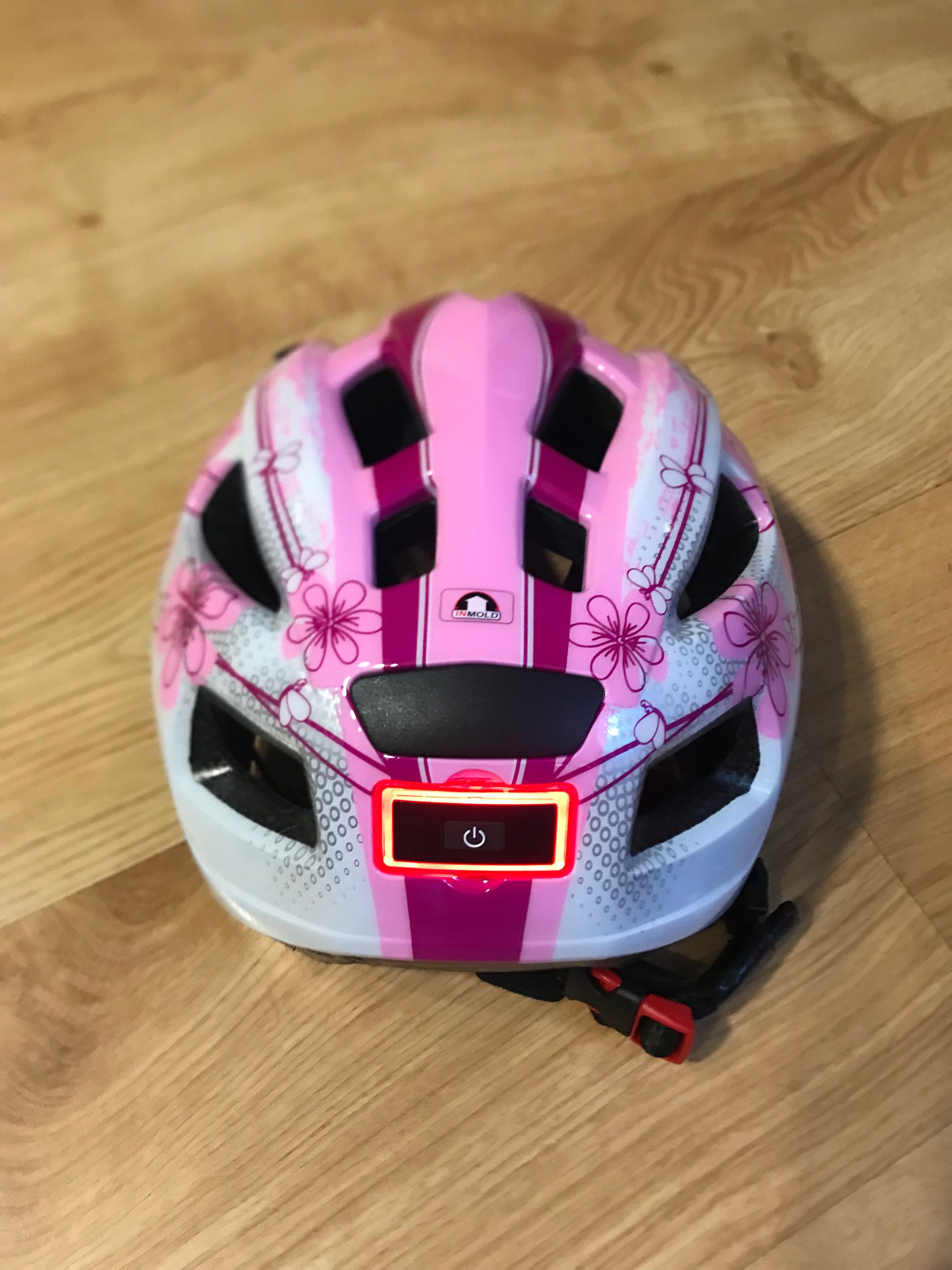 Kask dziewczęcy z lampka z tylu