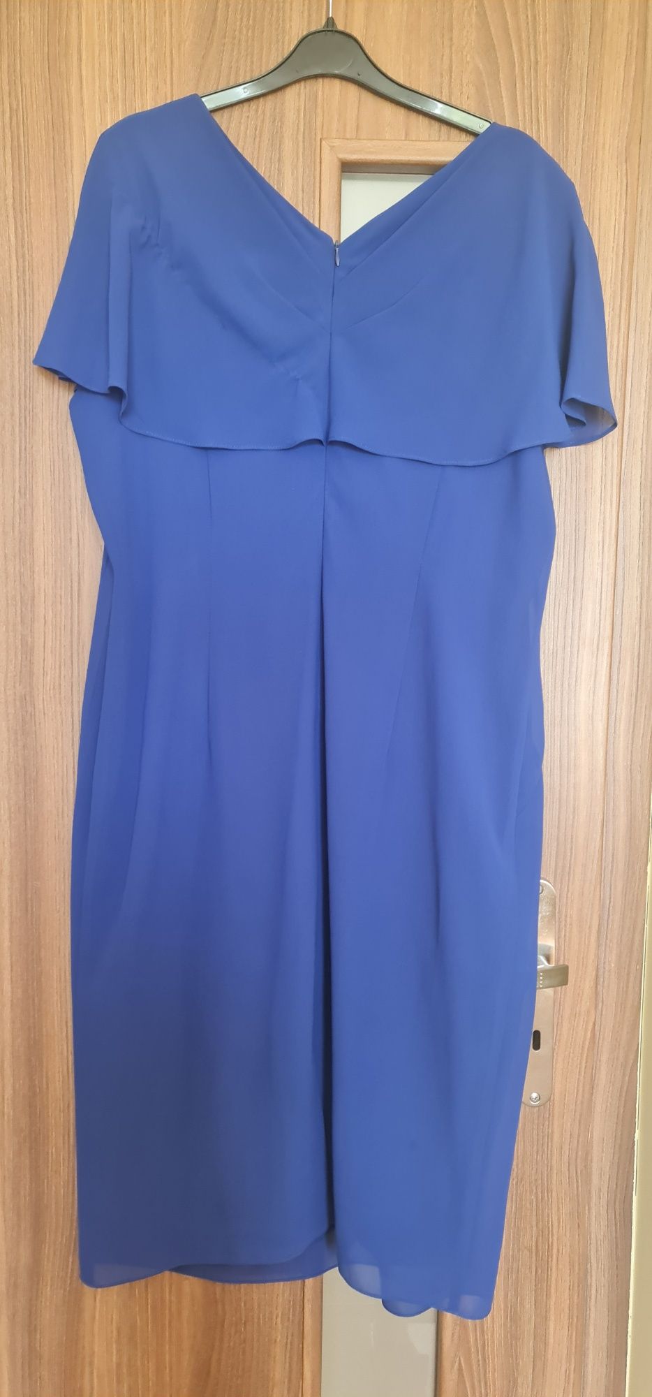 Niebieska sukienka r. 48