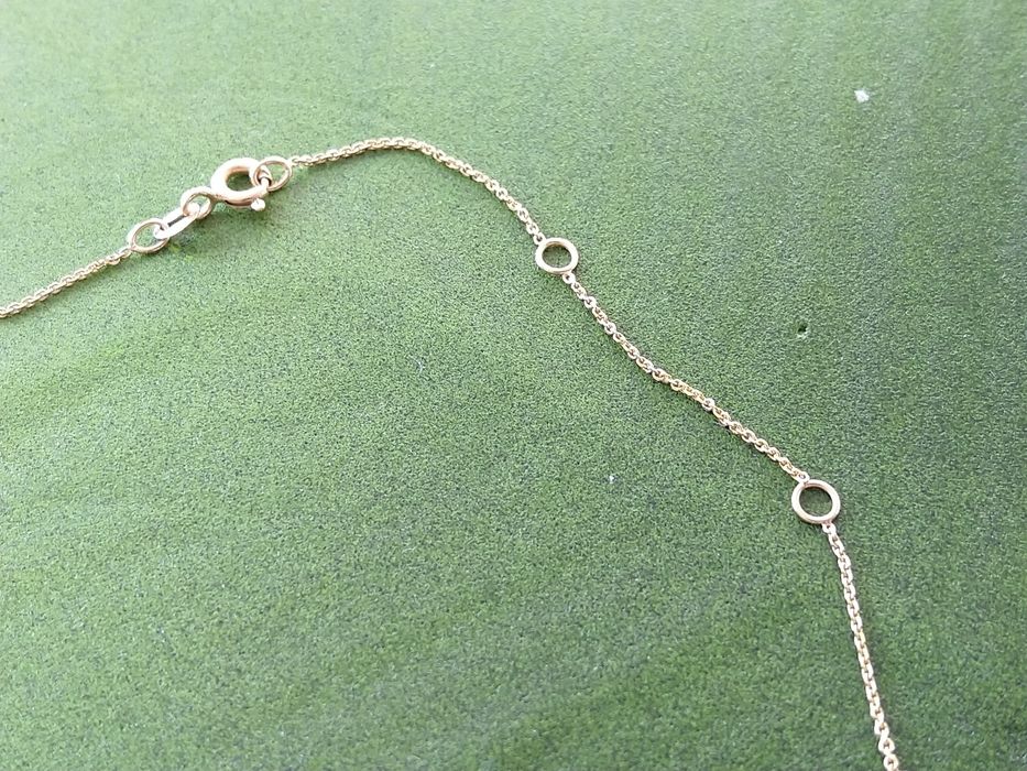 Złoty naszyjnik nieskończoność z sercem