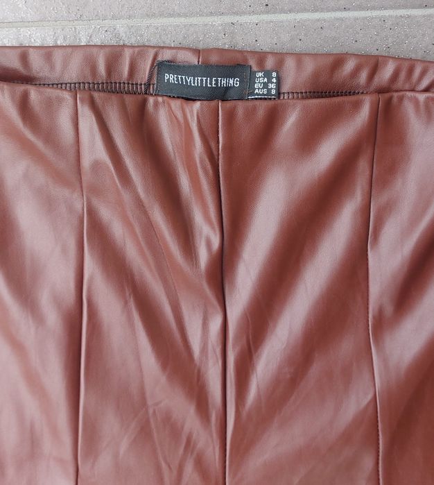 Spodnie skórzane eko skóra latex szerokie nogawki rozcięcia S 36 Nowe