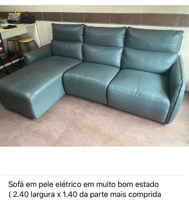 Sofá em pele com cheais