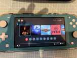 Nintendo Switch Lite + gry
