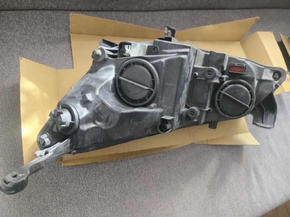 Farol Opel Astra 2011