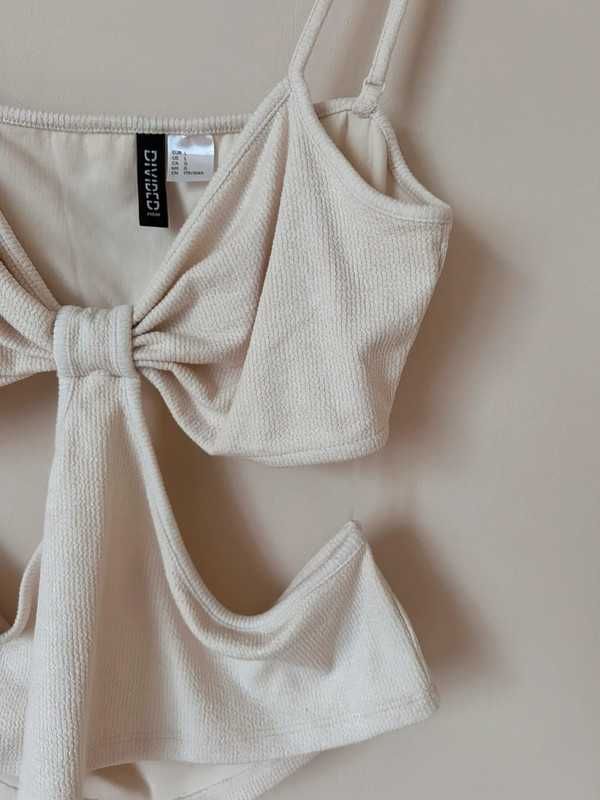 Top crop H&M bluzka mocno wycięta L kokarda beżowa kremowa