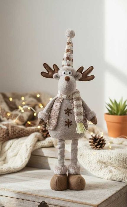 Reniferek świąteczny z rozciąganymi nogami