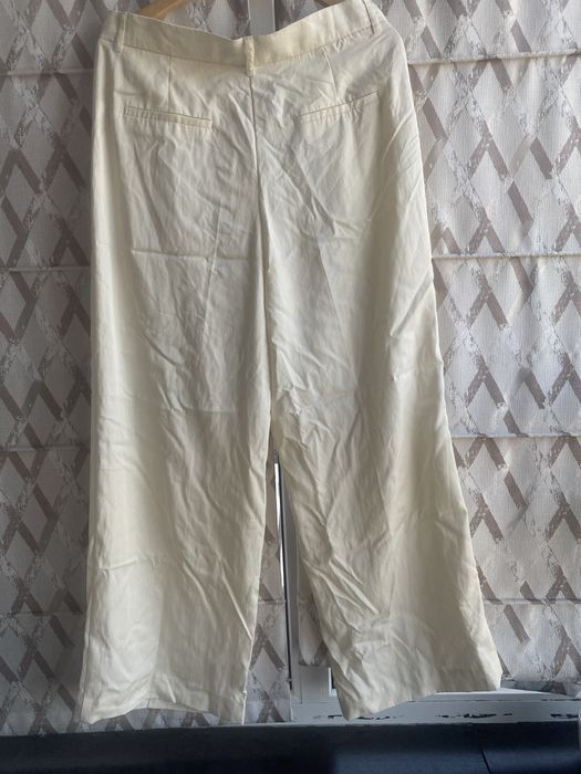 Штани білі кльошні zara