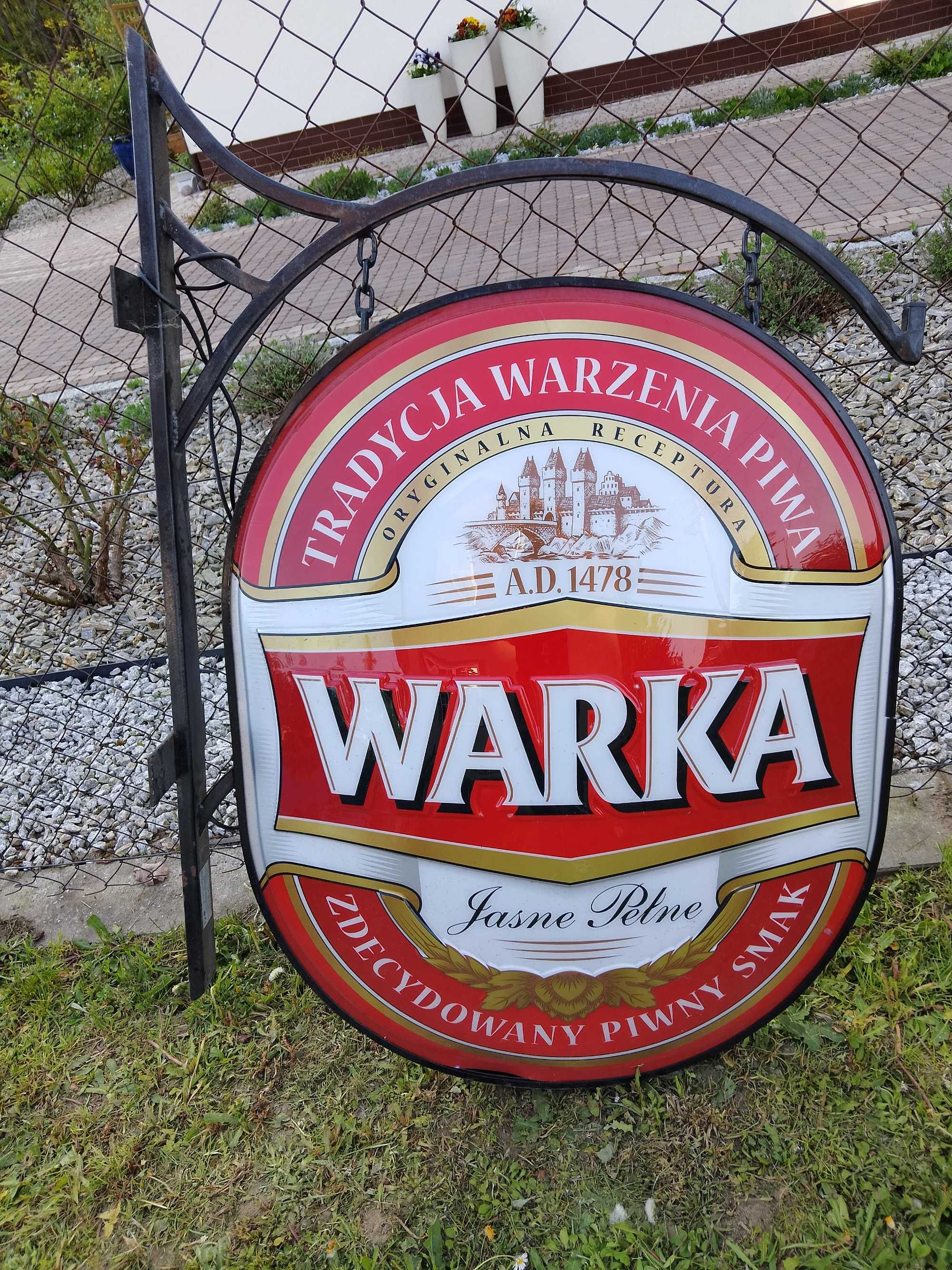 Reklama, neon świetlny piwa Warka