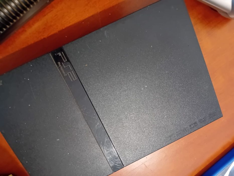 PS2, MEGA DRIVE II, com jogos, cabos e comandos.