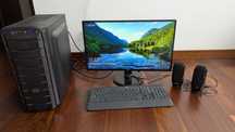 Computador fixo com monitor, torre e teclado