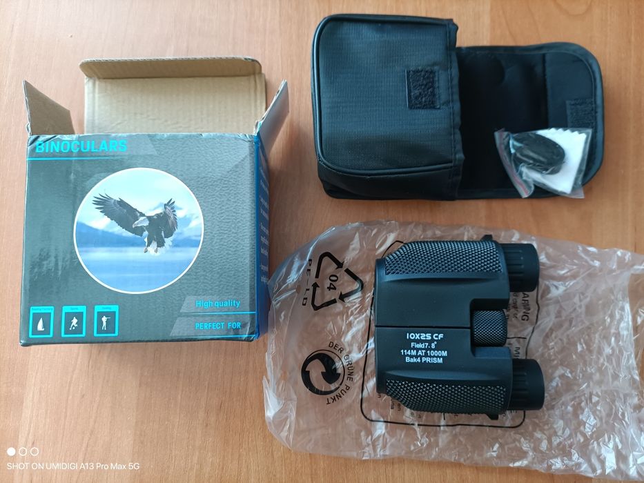 Компактний бінокль