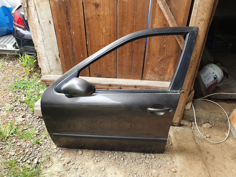 Seat Toledo II (1M) Drzwi przednie lewe + lusterko(1m0857689)