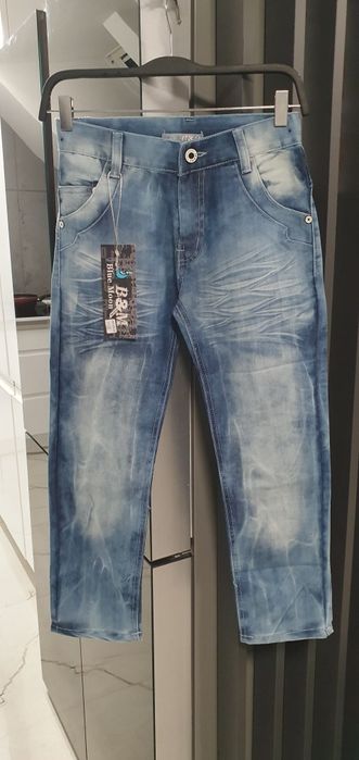 Spodnie jeansowe nowe 10 lat