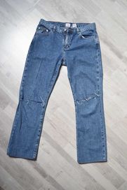 Calvin Klein spodnie jeansowe CK M dziury
