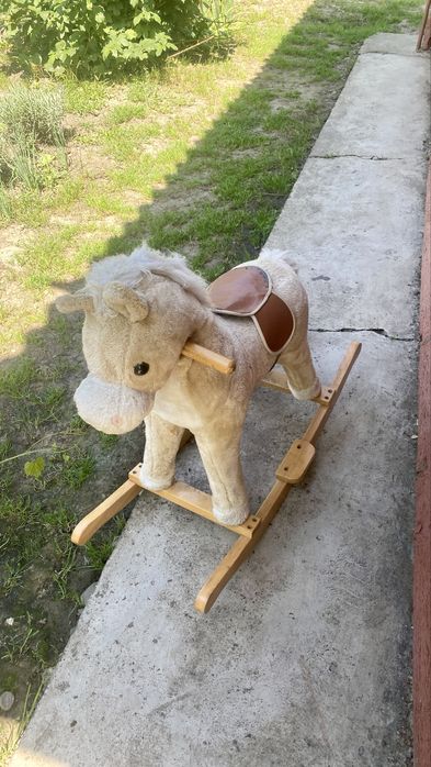Коник гойдалка музичний музикальний