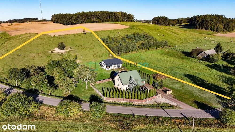 Dom z budynkiem gospodarczym w malowniczej okolicy