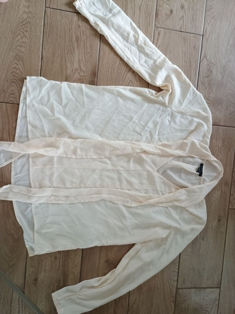Piękna elegancka bluzka ecru wiązana pod szyją stan idealny