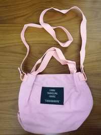 Bolsa carteira em tecido cor de rosa para menina