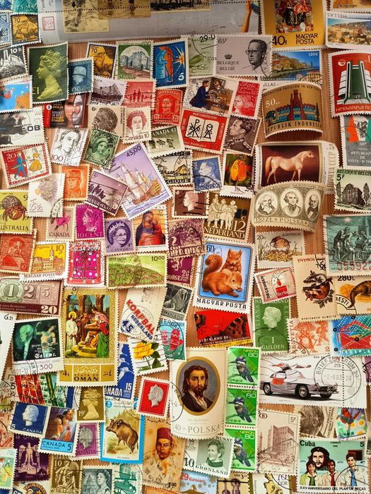 Znaczki pocztowe cały świat 1000szt + 100szt GRATIS