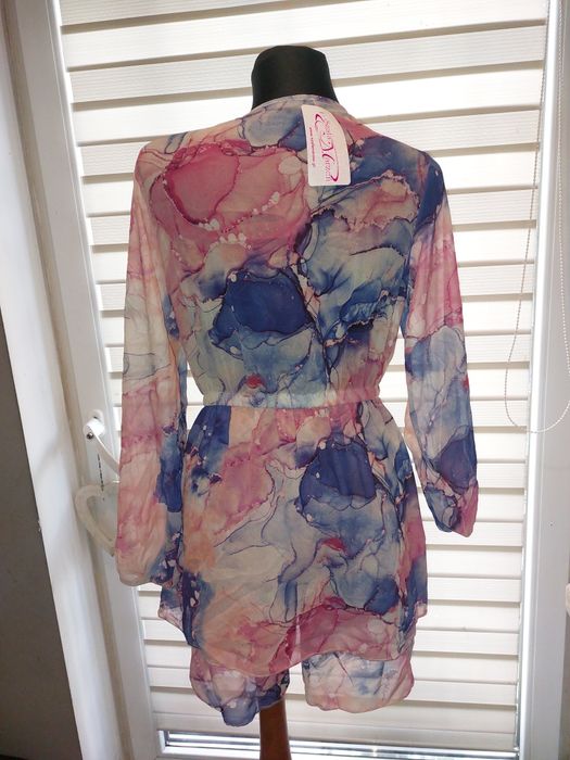 Nowy kombinezon damski kopertowy marmurkowy
Rozmiar S M