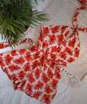 Nowy kremowy kombinezon w czerwone kwiaty top shop s 36 halter z wiąza