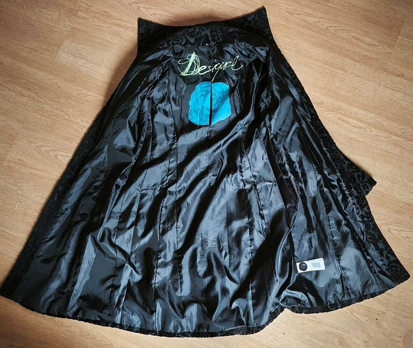 Casaco comprido preto