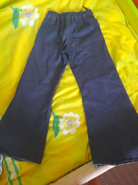 Широкі джинси 134 розмір