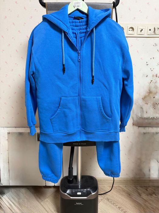 Теплий костюм блакитного кольору