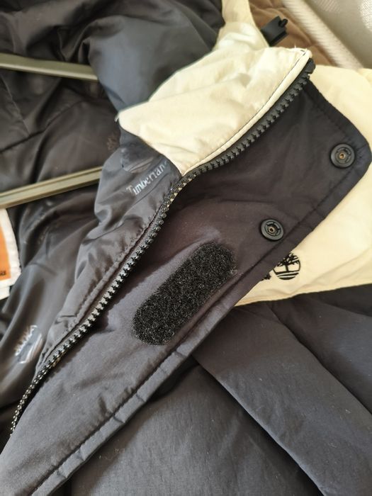 Kispo de cor beje e preto da marca Timberland