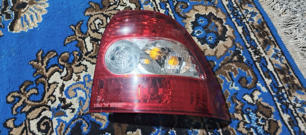 заводський задній правий фонарик на приору ОРИГІНАЛ