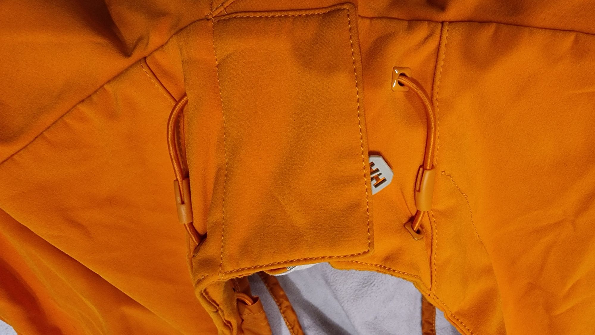 Piękna kurtka Helly Hansen  pomarancz L super
