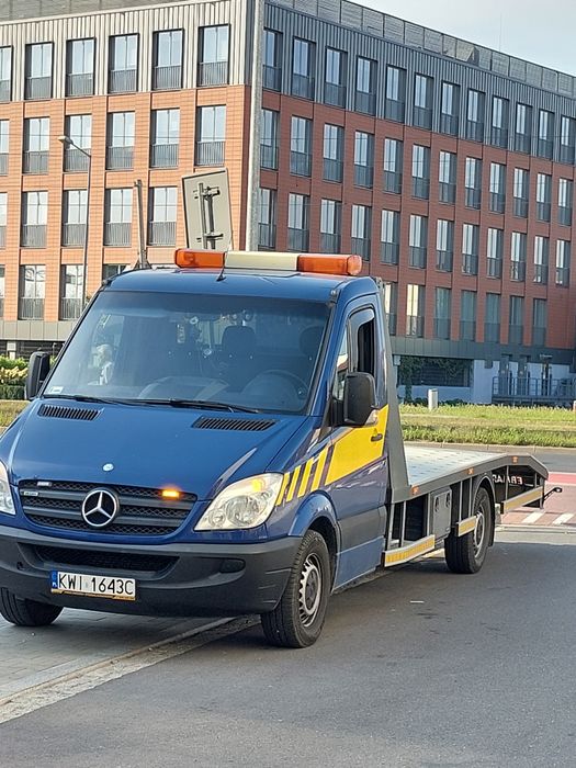 pomoc drogowa laweta transport pojazdow holowanie wieliczka krakow A4