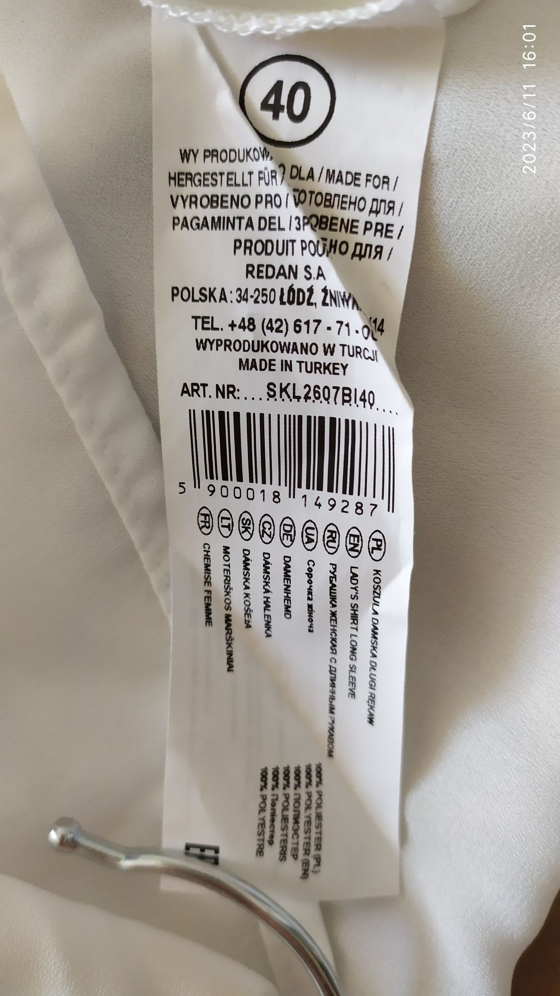 314. Damska luźna koszula z falbanami biała top secret