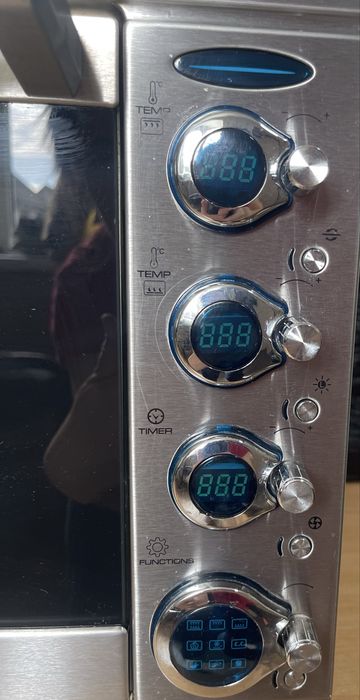 Духовка окремостояча з нержавіючої сталі