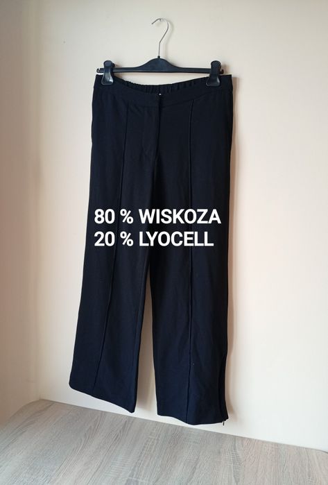 Czarne eleganckie szerokie spodnie z kieszeniami,ARKET, rozmiar L