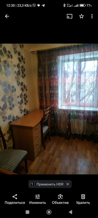 Комнату в доме гостиного типа