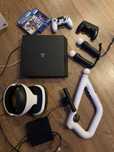 Playstation 4 + VR + comandos + arma + move + jogos