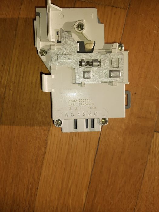 Замок люка Indesit/Ariston, 16001300106