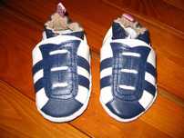 Sapatos em pele 0-5meses novos nunca usados
