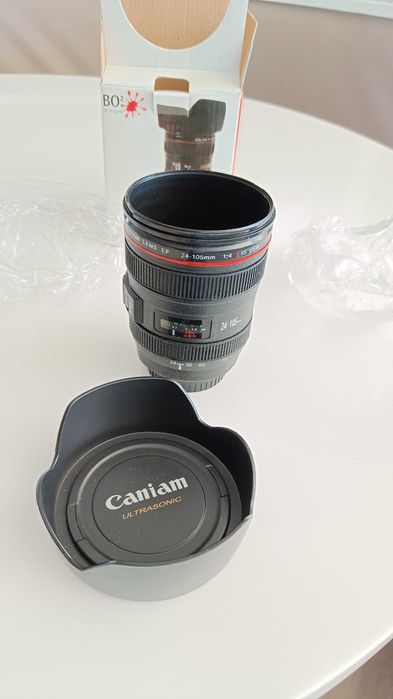 Copo novo com aspeto de lente fotográfica
