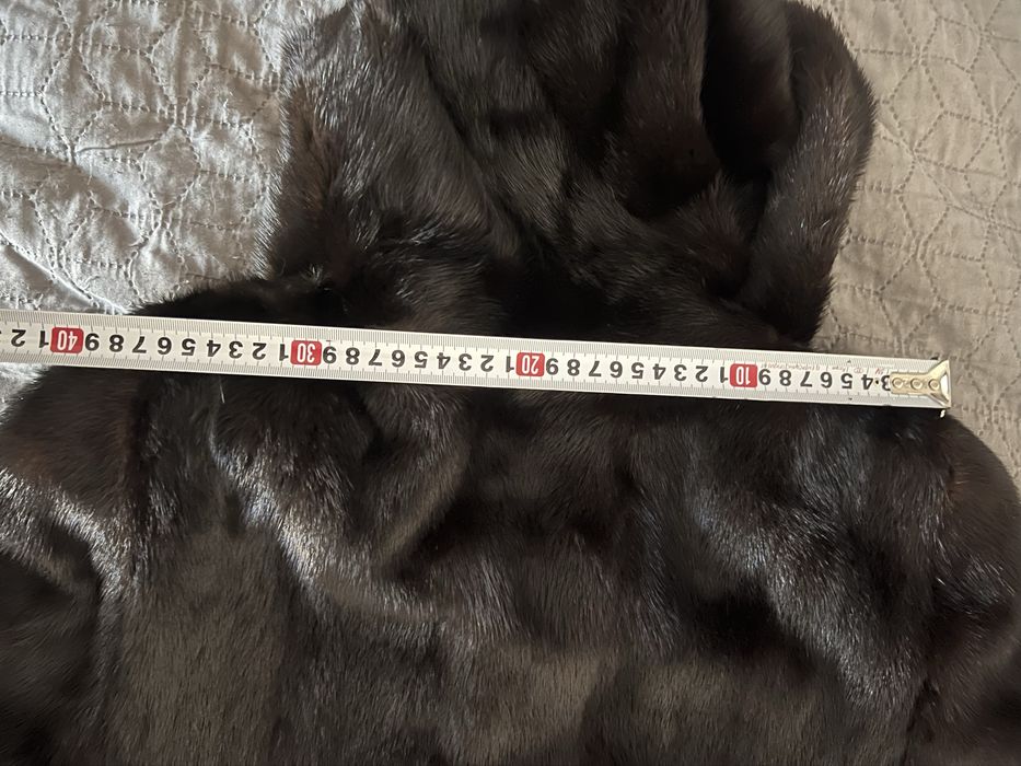 норкова шуба тепла